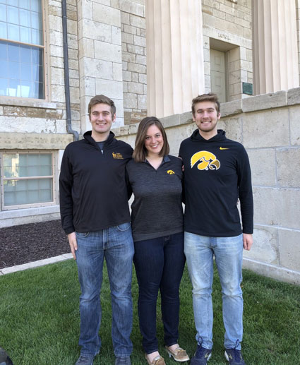 Kollasch siblings (from left) Zachary, Anna Kate, and Anthony all are attending graduate school at the University of Iowa in different graduate programs.