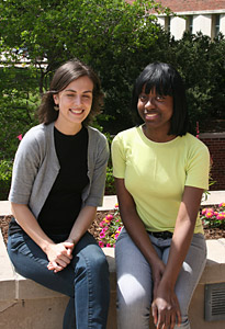 (From left) Katie DeVries Hassman, a 2011 graduate of the School of Library and Information Science master’s program, is pictured with undergraduate Kanithia Looney, a student in the information handling course taught by Hassman last spring.