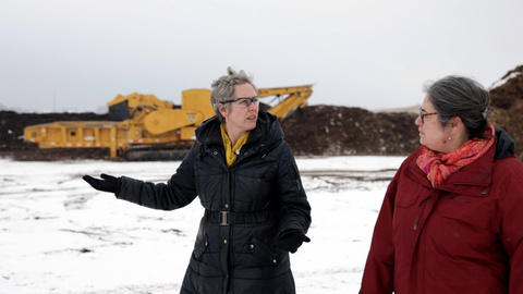 Jennifer Jordan gives Lucie Laurian a tour of the Iowa City landfill.