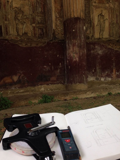 Dr. Aung's sketch, tools, and part of the fountain at the Villa San Marco