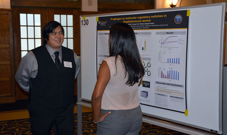 SROP student presents his research at the Summer Undergraduate Research Conference.
