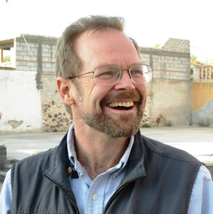 Headshot of Christopher Merrill smiling