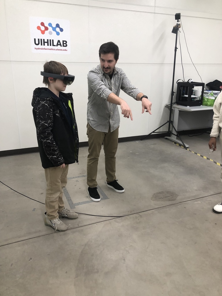Demiray works with child using VR technologies