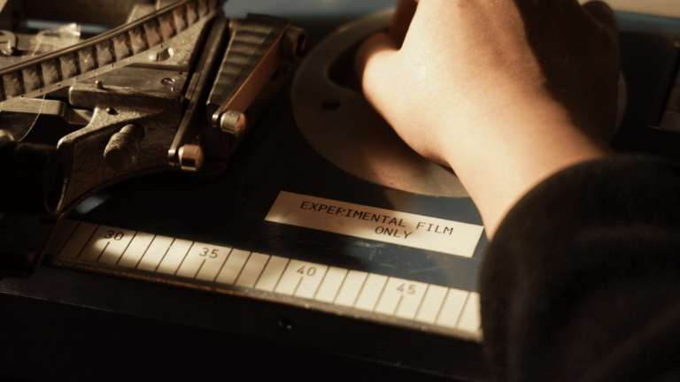 Getong Wang at the film editing table