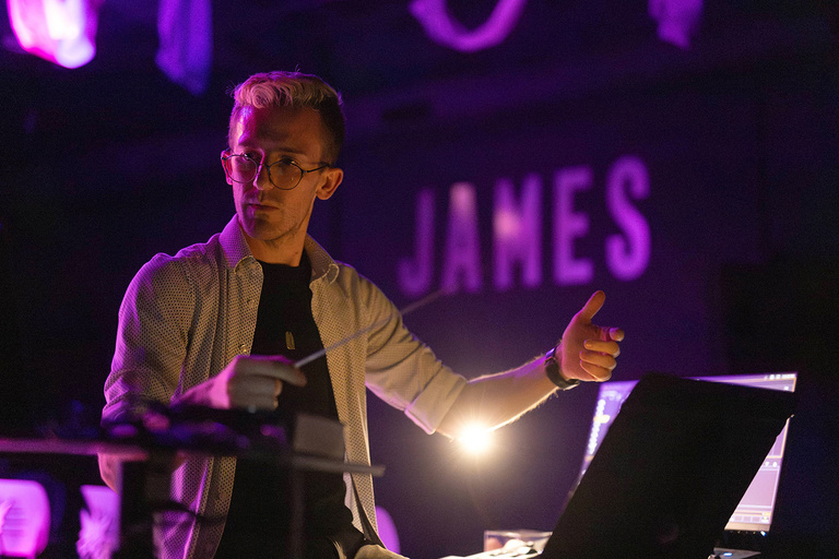 Blake Cordell conducting his jazz ensemble at The James