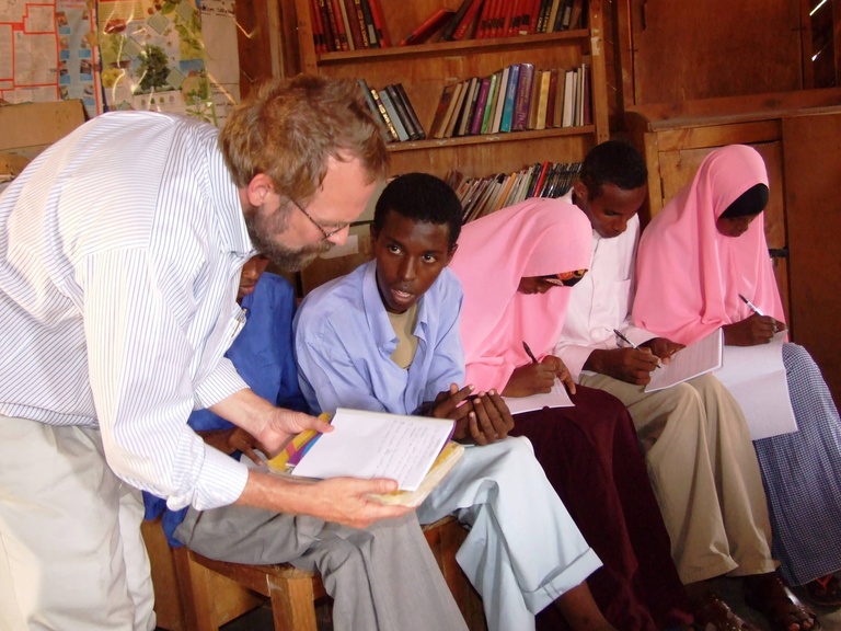 Christopher Merrill with students in Dadaab refugee camps