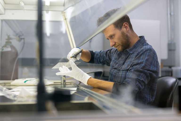 Jacob Payne cleaning glass