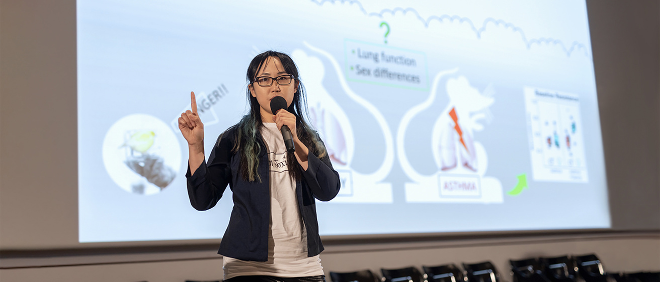 Vingie Ng competing at the Three Minute Thesis competition